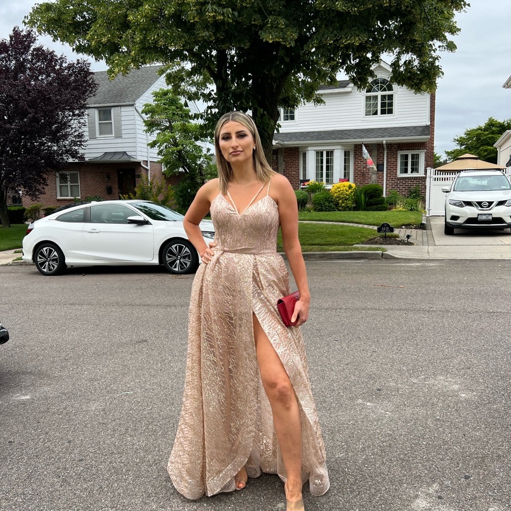 Self designed dress, rose gold,has a damage in the lining but not visible.